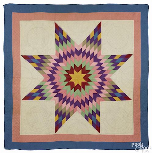 Pennsylvania lone star quilt, ca. 1890, with a double border, 80'' x 80''.