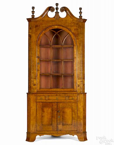 Pennsylvania tiger maple veneer two-part corner cupboard, early 19th c., 100 1/2'' h., 43'' w.