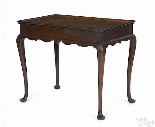 Massachusetts Queen Anne mahogany tea table, ca. 1760, with a dished top and scalloped apron