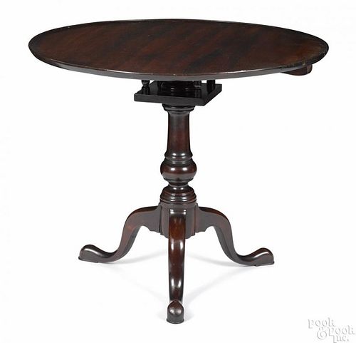 Pennsylvania Queen Anne mahogany tea table, ca. 1765, with a suppressed ball standard and pad feet