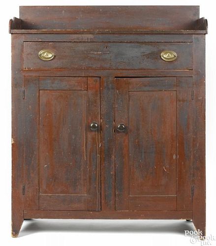 Pennsylvania painted poplar jelly cupboard, 19th c., retaining an old dry red surface, 51 1/2'' h.