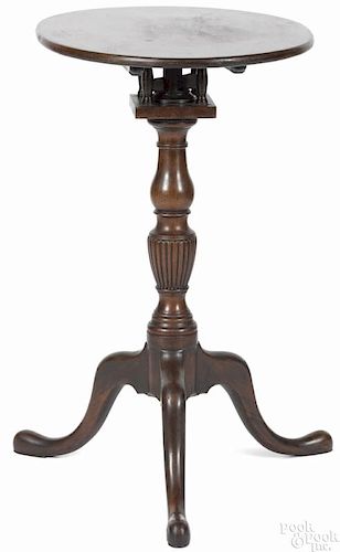 Queen Anne mahogany candlestand, late 18th c., the oblong top tilting on a birdcage