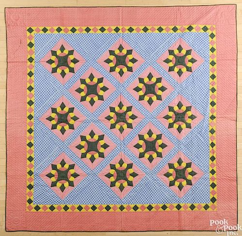Pieced and appliqué flower in diamond quilt, ca. 1900, 82'' x 83''.