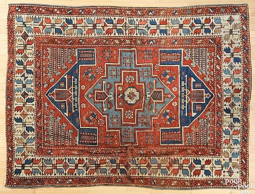 Kazak carpet, early 20th c., 7'4'' x 5'6''.