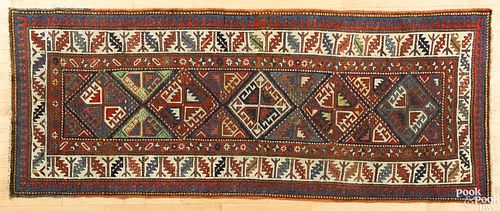 Kazak carpet, early 20th c., 8' x 3'2''.