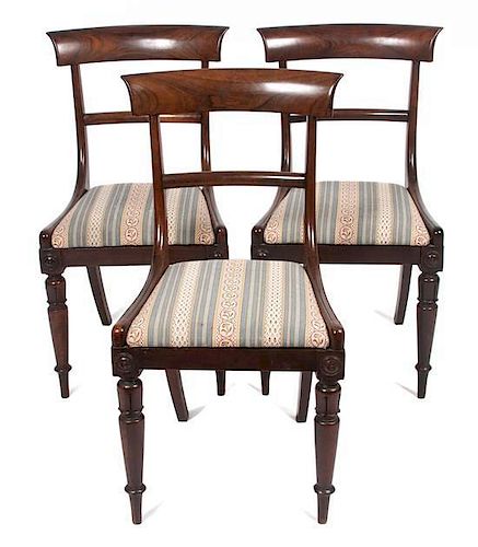 * A Set of Eight Regency Rosewood Dining Chairs Height 33 inches.