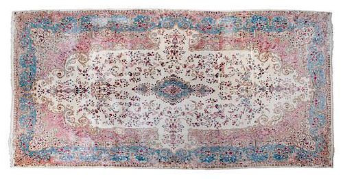 * A French Style Wool Carpet 23 feet 4 inches x 11 feet 4 inches.