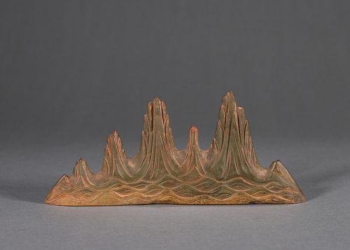 A seawater and cliff patterned inkstone brush stand