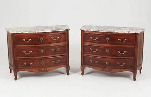 PAIR OF LOUIS XV PROVINCIAL CARVED WALNUT SERPENTINE COMMODES