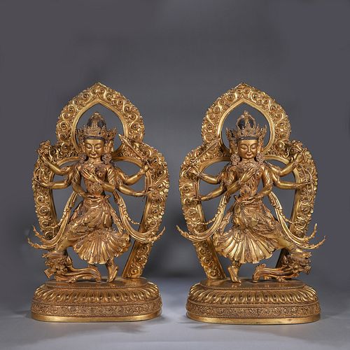 2 copper buddha statues