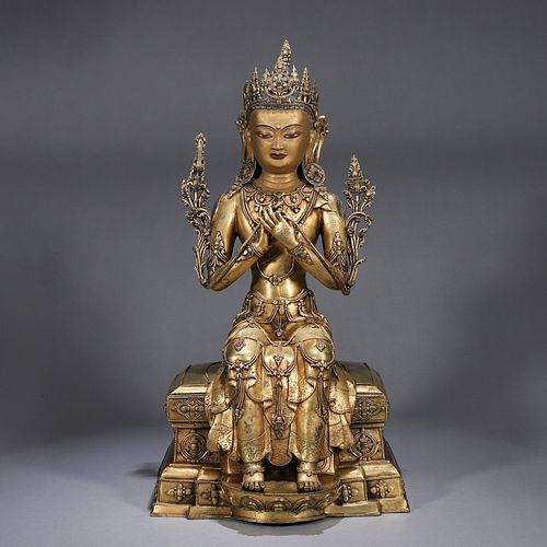 A copper Maitreya buddha statue