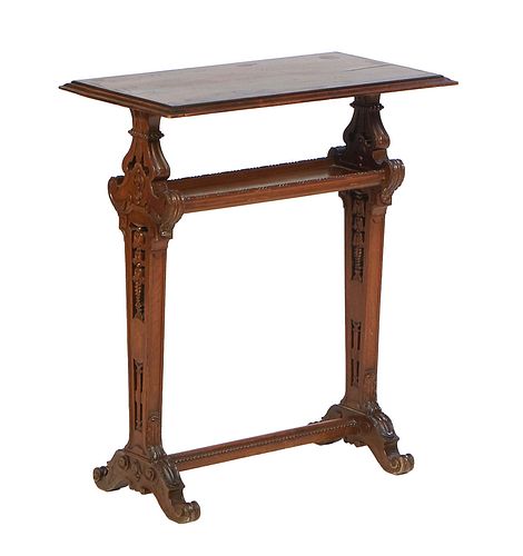 French Louis XVI Style Carved Walnut Book Stand, 20th c., the stepped rectangular top on pierced trestle supports joined by an upper galleried shelf a
