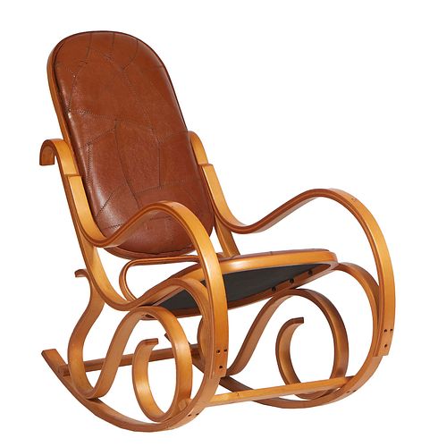 French Bentwood Cherry Rocker, 20th c., the arched upholstered back over an upholstered seat, flanked by scrolled arms, on S-form supports to rockers,