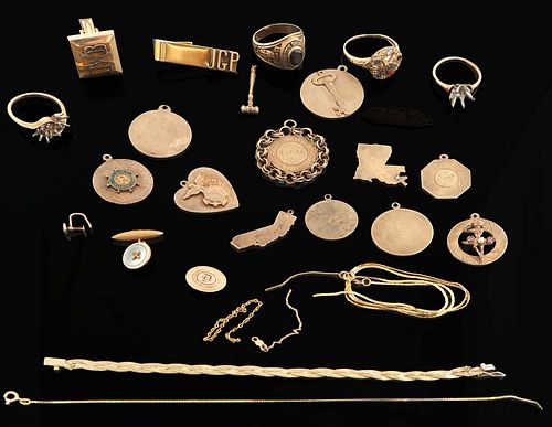 14K Yellow Gold Items, consisting of two gold bracelets; a necklace; three ring mounts; twelve charms; a class ring, 1969; a tie clasp; a mezzuzah cha