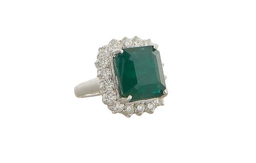 Lady's 18K White Gold Dinner Ring, with a 14.75 carat emerald atop a border of round diamond points, total diamond wt.- 2.4 cts., size 5 1/2, with app