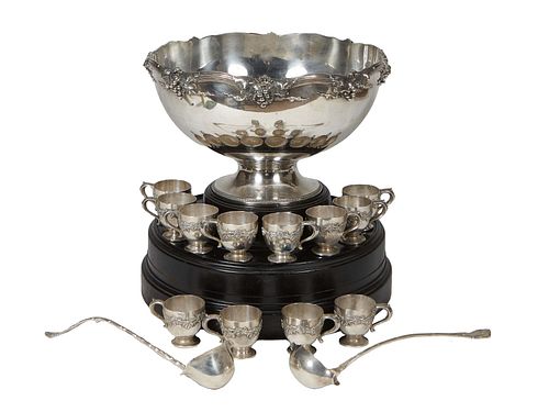 Fifteen Piece Sterling Punch Set, early 20th c., by Whiting, consisting of a large punchbowl, #227, 28 pints, in a grape and vine motif, H.- 9 3/8 in.