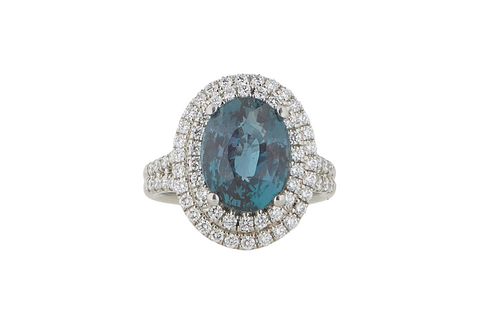 Incredibly Rare Lady's Platinum Dinner Ring, with a 7.96 carat Indian oval alexandrite surrounded by a double concentric border of tiny round diamonds