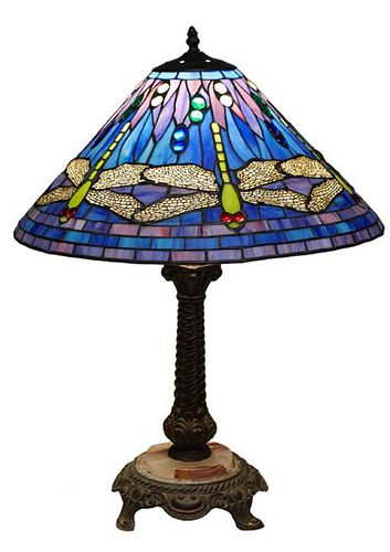 Contemporary Tiffany Style Dragonfly Leaded Glass Lamp, 20th c., the blue and lavender shade with circular cabochon jewels, on a patinated spelter twi