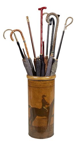 Tole Umbrella Stand, 20th c., with 11 lady's parasols with varying wood and metal handles, Stand- H.- 18 in., Dia.- 8 in., Largest Parasol- H.- 37 1/2
