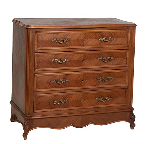 French Louis XV Style Carved Walnut Commode, early 20th c., the stepped serpentine top over a bank of four drawers, flanked by reeded rounded edge pil