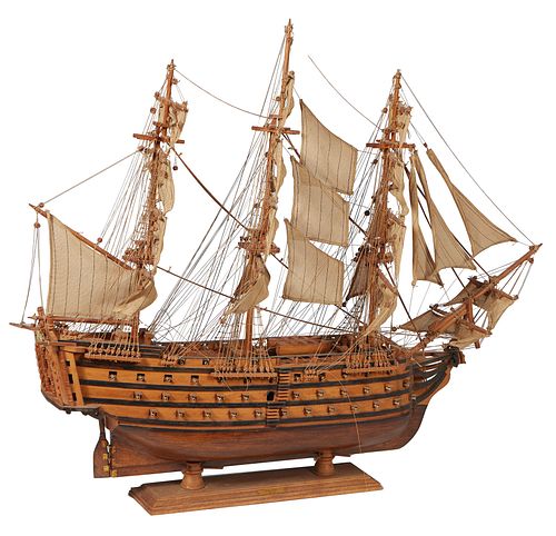 Large Carved Wooden Ships Model, "HMS Victory, 1805" 20th c., in full sail, on a wooden stand, with a brass nameplate, H.- 35 in., W.- 44 in., D.- 7 1