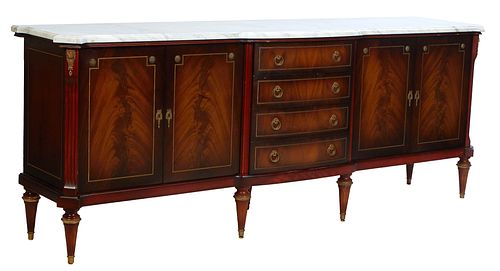French Louis XVI Ormolu Mounted Carved Cherry Marble Top Sideboard, 20th c., the thick figured ogee edge white marble atop a base with a central bank 