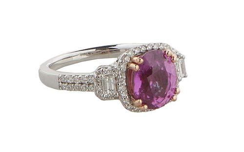 Lady's 14K White Gold Dinner Ring, with a cushion cut 2.97 carat pink sapphire atop a border of tiny round diamonds, flanked by baguette diamond mount