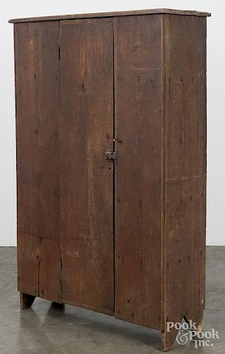 Virginia walnut canning cupboard, 19th c., with a shelved interior and cutout feet, 61'' h., 37'' w.