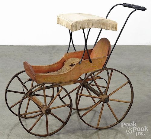 Victorian child's stenciled wood doll pram, late 19th c., 27'' h., 29'' l.