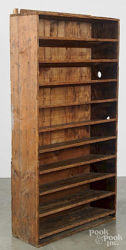 Primitive pine country store display cupboard, 19th c., the shelves canted back, 56'' h., 33 1/2'' w.