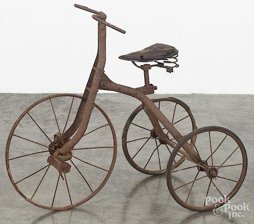 Primitive iron child's bicycle, 19th c., 23'' h. Provenance: Barbara Hood's Country Store