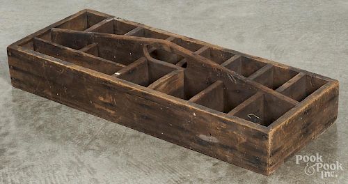 Two primitive pine divided carriers, 19th c., with cutout handles, 6'' h., 31'' l.