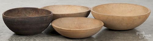 Four turned wood bowls, early 20th c., largest - 15'' dia. Provenance: Barbara Hood's Country Store