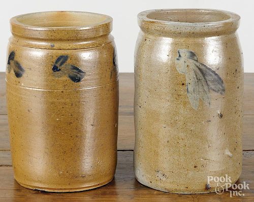 Two Pennsylvania stoneware jars, 19th c., with cobalt floral sprays, 8 3/4'' h. and 8 1/2'' h.