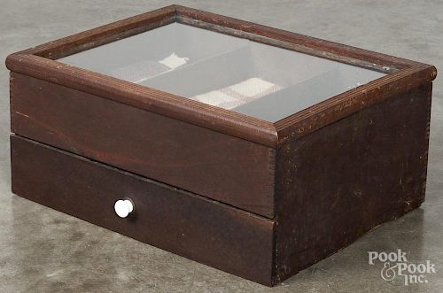 Country store counter top display case, ca. 1900, with a hinged lid, over a single width drawer