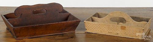 Two utensil carriers, early 20th c., one in walnut, the other with an impressed stone wall pattern