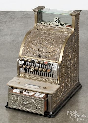 Brass National cash register, 20th c., model #313, serial #794044, 17'' h., 10'' w.