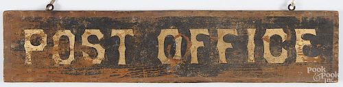 Painted pine Post Office sign, ca. 1900, having gilt letters on a black background, 6'' x 28''.