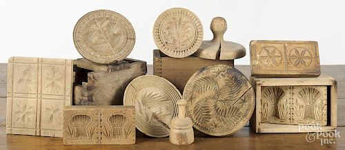 Ten carved wooden butter molds, 19th/20th c., largest - 4 7/8'' dia. Provenance: Barbara Hood