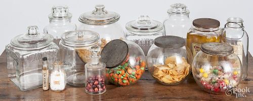 Colorless glass country store jars, 20th c., to include Planters peanuts, National Biscuit, etc.