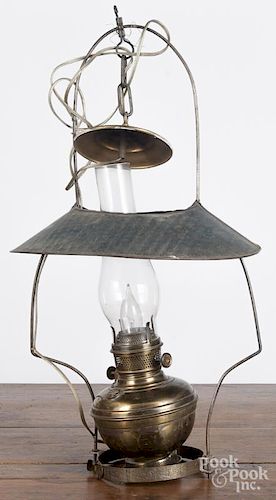 Tin and brass country store hanging lamp, ca. 1900, 26'' h. Provenance: Barbara Hood's Country Store
