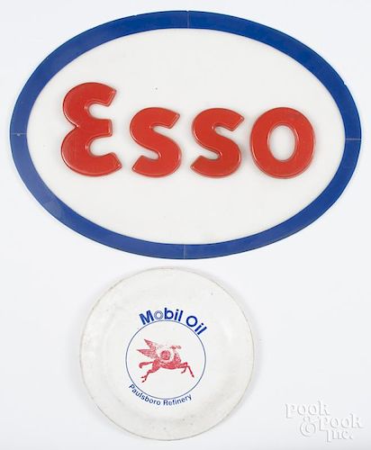Molded plastic Esso gasoline sign, 20th c., 13'' x 18 1/2'', together with a Mobile Oil frisbee.