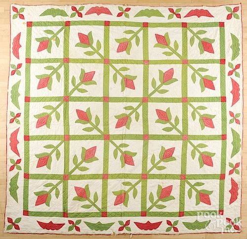 Pennsylvania tulip appliqué quilt, late 19th c., with a swag border, 104'' x 102''