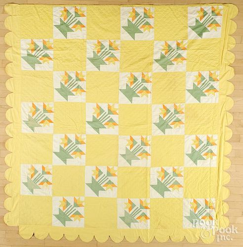 Patchwork basket of flowers quilt, early/mid 20th c., with a scalloped edge, 83'' x 76''.