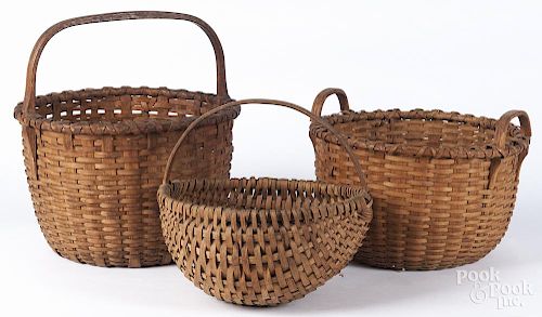 Three Pennsylvania splint gathering baskets, 19th c., with fixed handles, tallest - 16''.