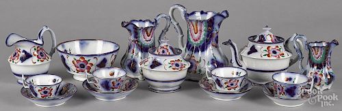 Gaudy Welsh tea service in the Snowdonia pattern, to include a teapot, a covered sugar, a creamer