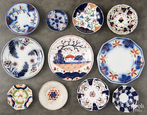 Sixteen Gaudy Welsh plates and saucers in various patterns.