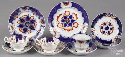 Five pieces of Gaudy Welsh in the Pinwheel pattern, to include a tea cup, three saucers
