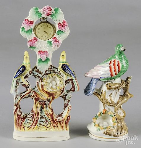 Staffordshire pair of birds watch hutch, 12'' h., together with a Staffordshire bird and nest