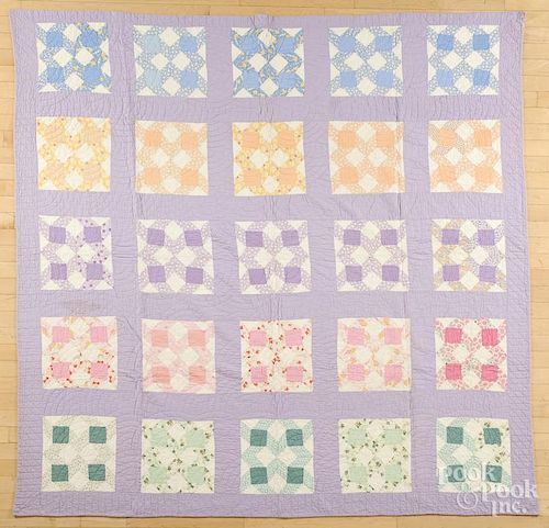 Two patchwork quilts, 20th c., to include a Dahlia pattern, 88'' x 75 1/2''